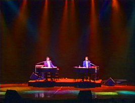 Chris and Doug performing on stage